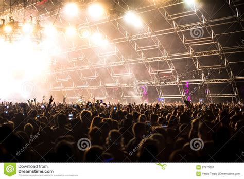 Concert Crowd In Front Of Led Stage Lighting Effects Stock Image