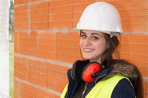 Premium Photo Female Architect At A Construction Site Looking Happy