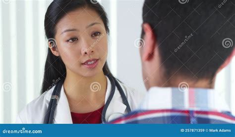 asian doctor talking to patient stock video video of doctor stethoscope 257871359