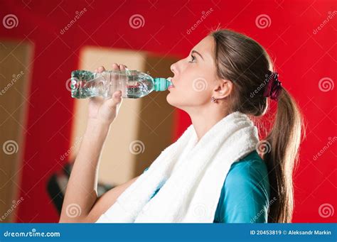 Woman At The Gym Drinking Water Stock Image Image Of Attractive Drop