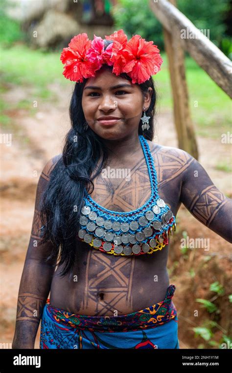 An Indigenous Embera Woman Dressed Up For Visitors In Her Village On Lake Alejuela In Panama
