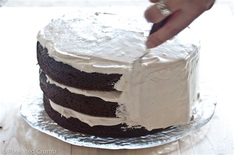 Spreading Marshmallow Frosting On Chocolate Cake Chocolate Marshmallow