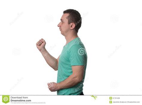 Portrait Of Angry Young Man Clenching His Fist Stock Image Image Of