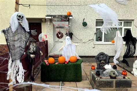 Disturbing Halloween Decorations Show Dead Body Hanging From Roof