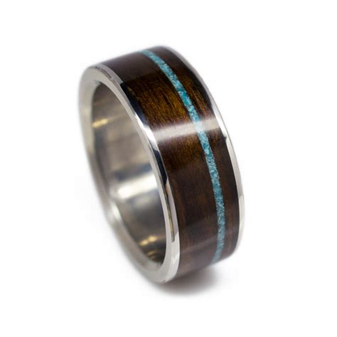 We offer a large selection of turquoise inlay rings in various sizes for immediate delivery. Men's Wood Wedding Band In Titanium, Ironwood, & Turquoise