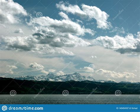 Landscape With Lake And View In The Snowy Swiss Alps 2 Stock Image