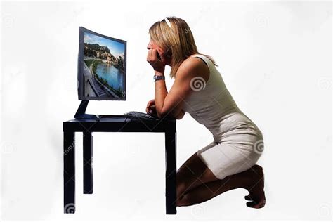 Woman On Her Knees With Her Elbows Leaning Against A Table Looking At A