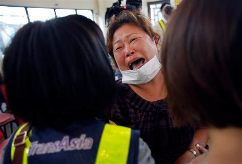 Surviver In Taiwan Plane Crash Crawls Out