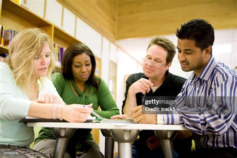 Adult Education Diverse Mature Students Working In Their College