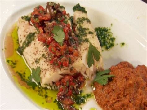 Steamed Wild Striped Bass With Yellow Pepper Romesco Red Pepper Black Olive Relish And Parsley
