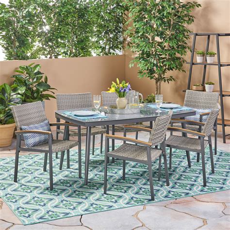 Dominic Outdoor 7 Piece Aluminum And Wicker Dining Set With Glass Top