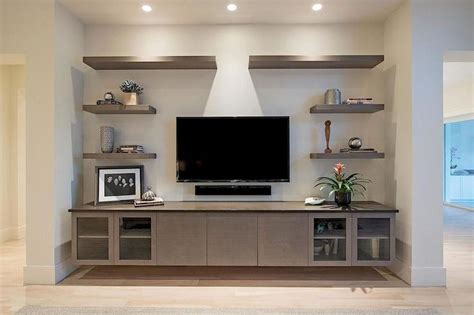 Entertainment centers go in your living room, bedroom or den and hold a variety of household items. #livingroominspiration (With images) | Living room ...