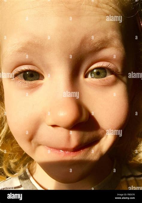 Little Girl Making A Cute Face At The Camera Hi Res Stock Photography