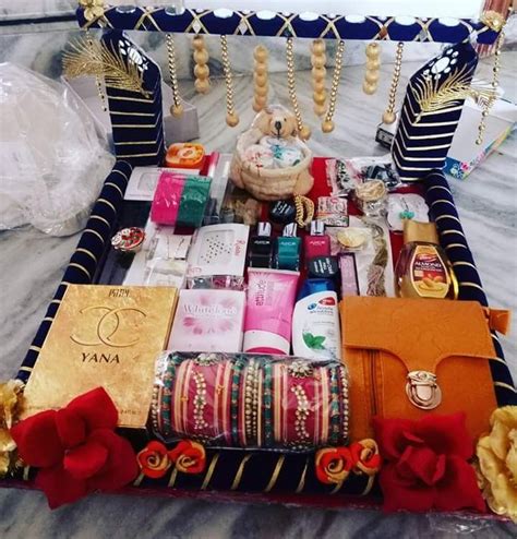 Jewelry and sweets are also added to the shagun. Wedding idea in 2021 | Wedding gift pack, Wedding gifts ...