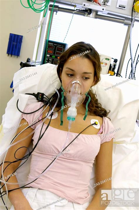 Female Patient Undergoing An Electrocardiography Ecg Examination