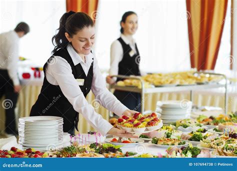 Restaurant Waitress Serving Table With Food Stock Photo Image Of