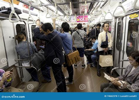 TOKYO CIRCA MAY Passengers Traveling By Tokyo Metro Business People Commuting To Work