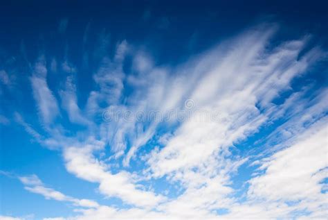 Dramatic Deep Blue Sky With Streaky Clouds Stock Photo Image Of Clean