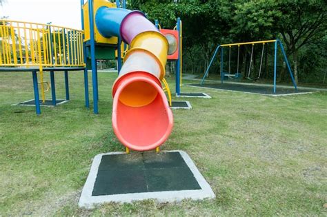 Premium Photo Colorful Children Slider Playground At Public Park