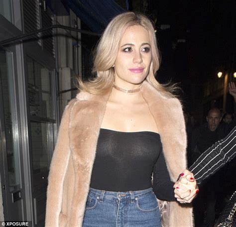 Pixie Lott Goes Braless Under Black Semi Sheer Top At London Club