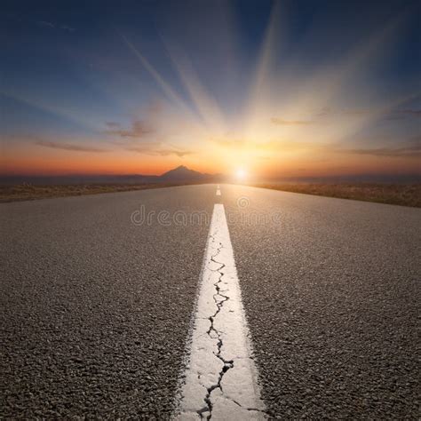 Driving On Open Road Towards The Mountain At Sunrise Stock Image
