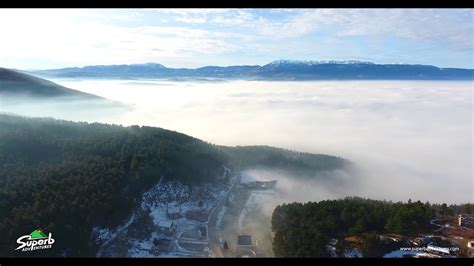 4K Sunny Weather above Foggy Sarajevo / Drone DJI Molly ...