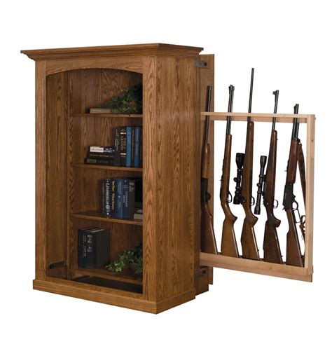 A hinge system folds the curio cabinet. Small Bookcase with Hidden Gun Cabinet from DutchCrafters ...