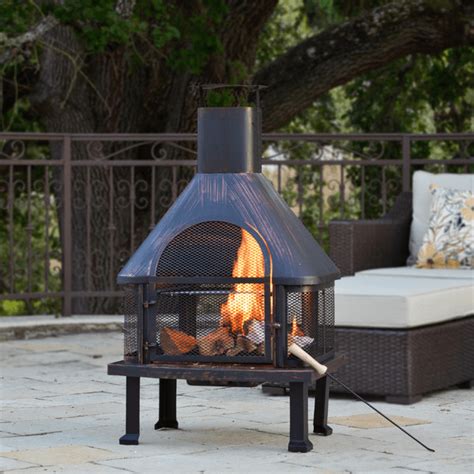 This burning fireplace features crackling fire sounds. Metal Fire Pits • Insteading