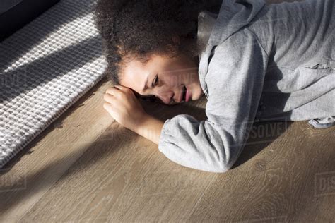 Girl Lying On Floor Crying Stock Photo Dissolve Hot Sex Picture