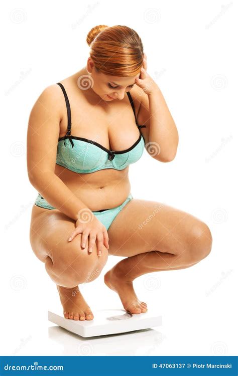 Fat Woman Squats On Scale Stock Photo Image
