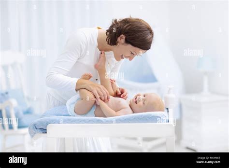 Diaper Changing Hi Res Stock Photography And Images Alamy