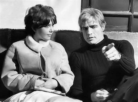 Marlon Brando With Pamela Franklin Between Takes On The Set Of “the