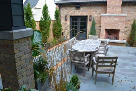 Backyard Patio With Outdoor Dining Table And Fireplace Hgtv
