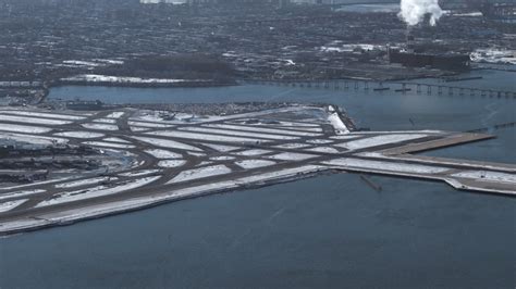 48k Stock Footage Aerial Video Of A Jet Landing At Laguardia Airport