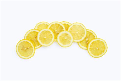 Premium Photo Fresh Lemon Slices Isolated On White Background