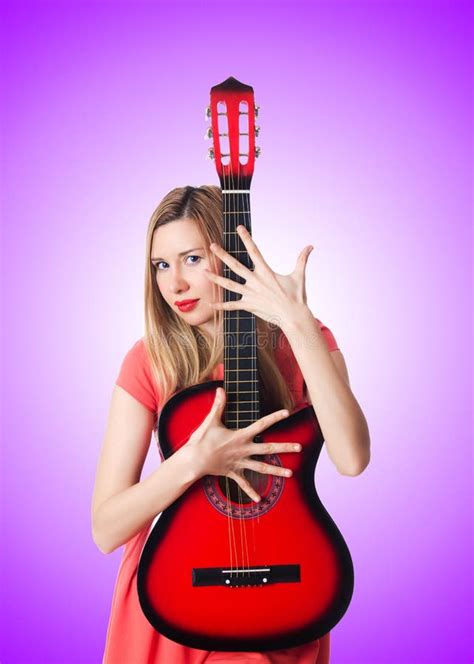 Female Guitar Player Against The Gradient Stock Image Image Of