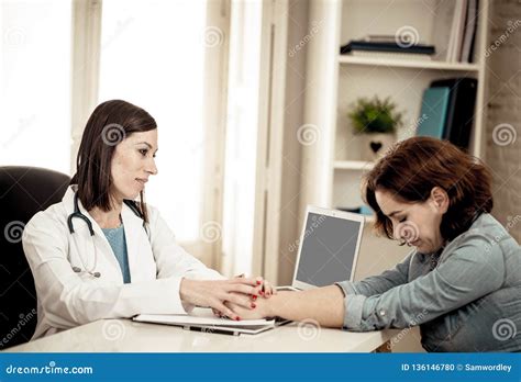 Female Doctor Explaining Bad News Diagnosis To Desperate Sad Patient Comforting Her With