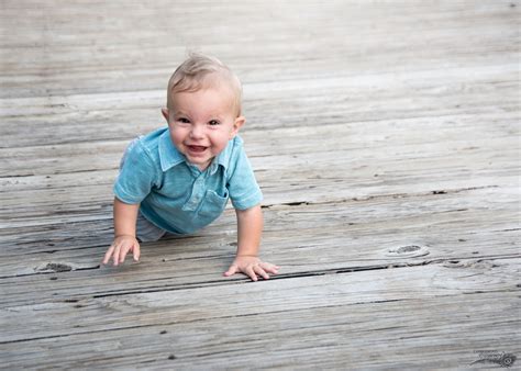 9 Month Baby Boy Crawling On Wooden Deck Wooden Decks Baby Month By
