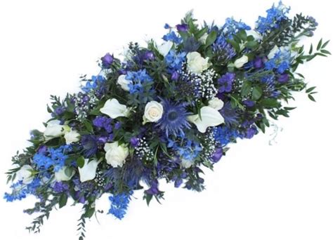 Choose from our range of funeral flowers, sympathy & condolences, wreaths, letter tributes, posies and baskets, sprays for any destination in uk. casket flowers bue and white - Google Search | Casket ...