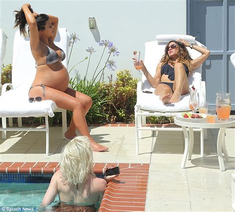 Kim Kardashian Shows Off Baby Bump In Bikini Just Days Before She Was