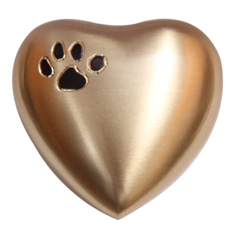 Our figurine pet urns for cremation ashes are made with a solid hardwood base and adorned with an attached alabaster/resin figurine. Pet Memorial Urns, Paw Print Golden Mini Heart Keepsake ...