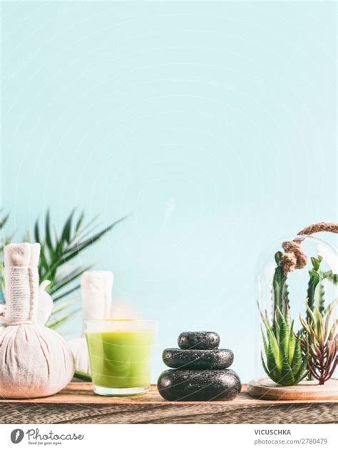 Spa Background With Massage Equipment Stack Of Massage Stones Aromatherapy Candles Herbal