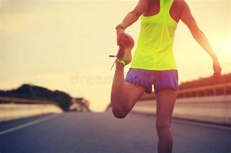 Fitness Woman Runner Stretching Legs On City Road Stock Photo Image