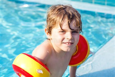 Happy Little Kid Boy Having Fun In An Swimming Pool Stock Image Image