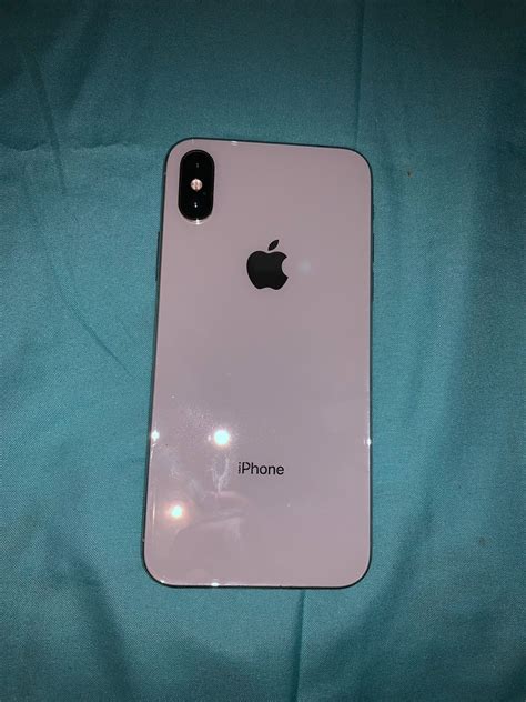 The iphone x display has rounded corners that follow a beautiful curved design, and these corners are within a standard rectangle. This is a original iPhone X, it is the silver white color ...