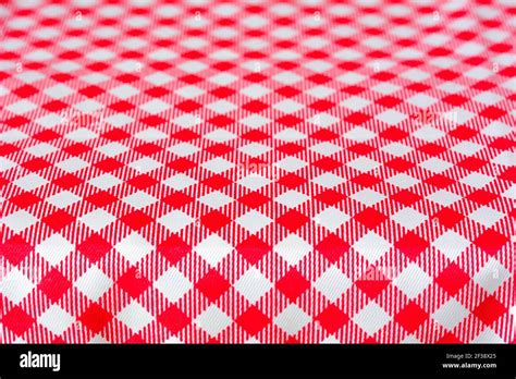 Table Covered With Red Checkered Picnic Tablecloth Can Be Used As