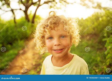 Portrait Of A Curly White Boy In The Park Stock Image Image Of