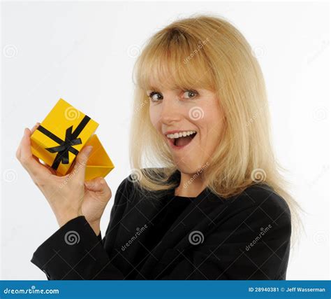 Attractive Blond Woman Opens T Box With Surprised Expression Stock Image Image Of Jacket