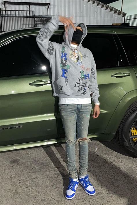 G Herbo Wearing A Rhude Hoodie With Amiri Jeans And Nike Dunks Inc Style