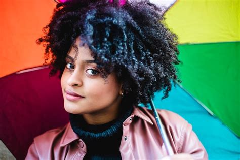 Premium Photo Young Woman Of Black Ethnicity With The Rainbow Colored
